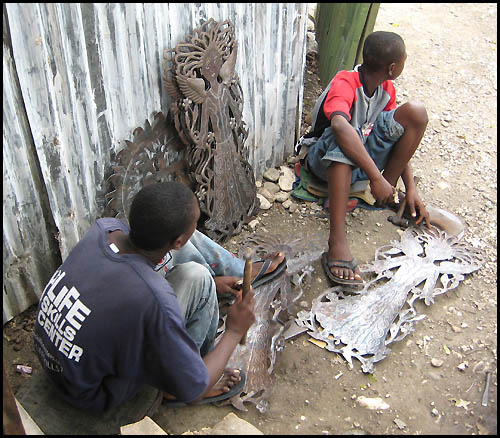The making of Haitian Steel Drum Metal Art from recycled steel drums  - Haiti Metal Art - www.haitimetalart.com 